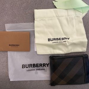 Burberry — Men’s classic single fold wallet.